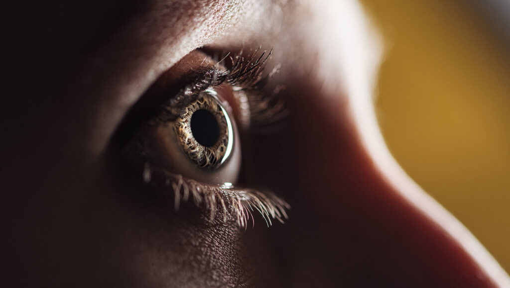 Close-up eye representing outdated attribution models in TV measurement