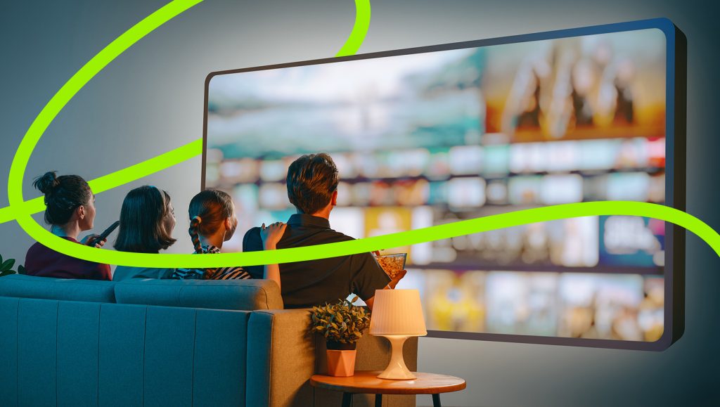 Digital ceiling: family watching a large TV screen, with a green growth line breaking through